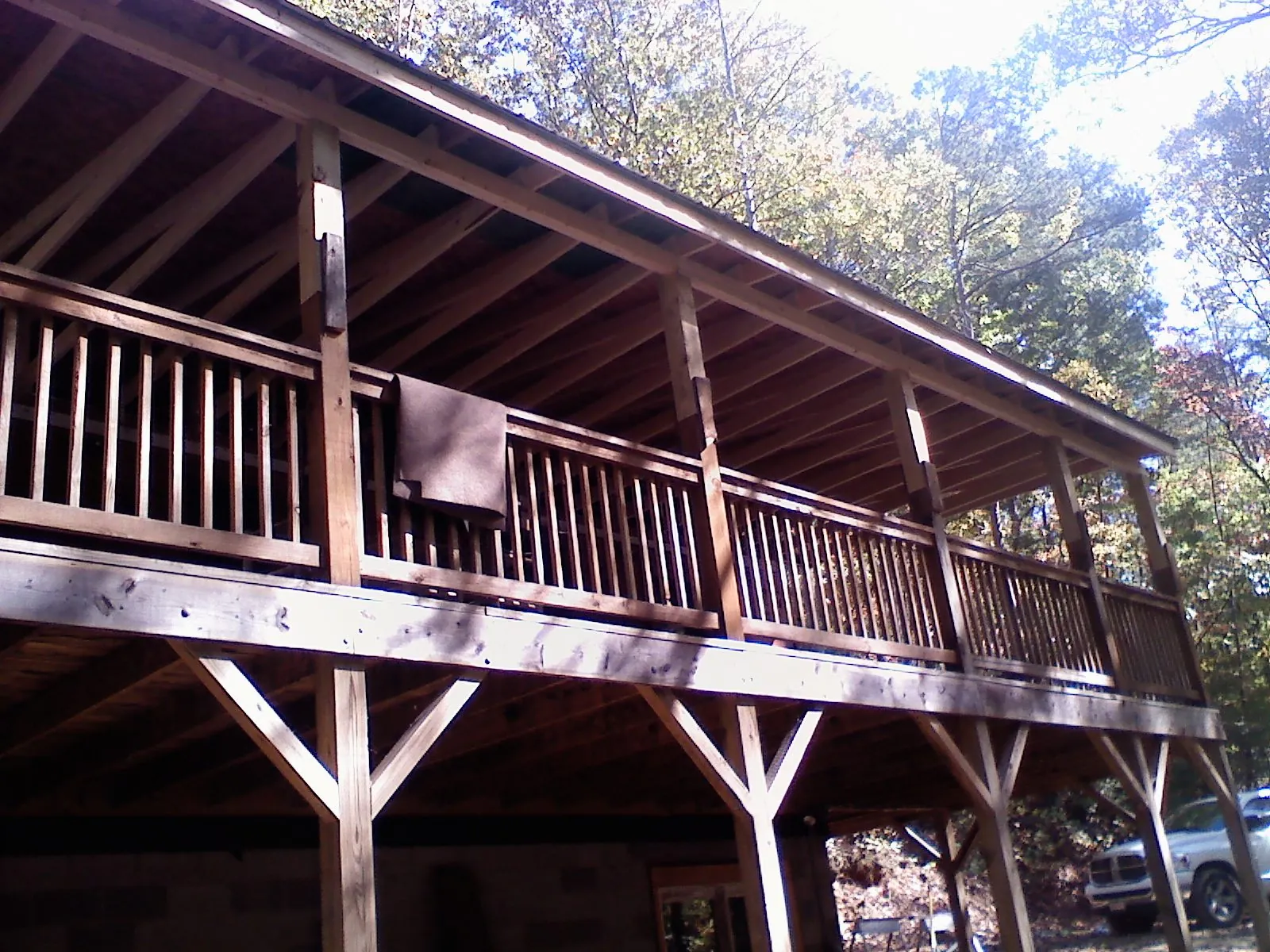 Timber framing under a new elevated porch and deck — Roof Leak Repair in Overpeck by Roofing Brothers